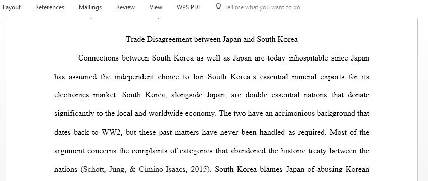 What historical motivations are there behind the current trade disagreement between Japan and South Korea